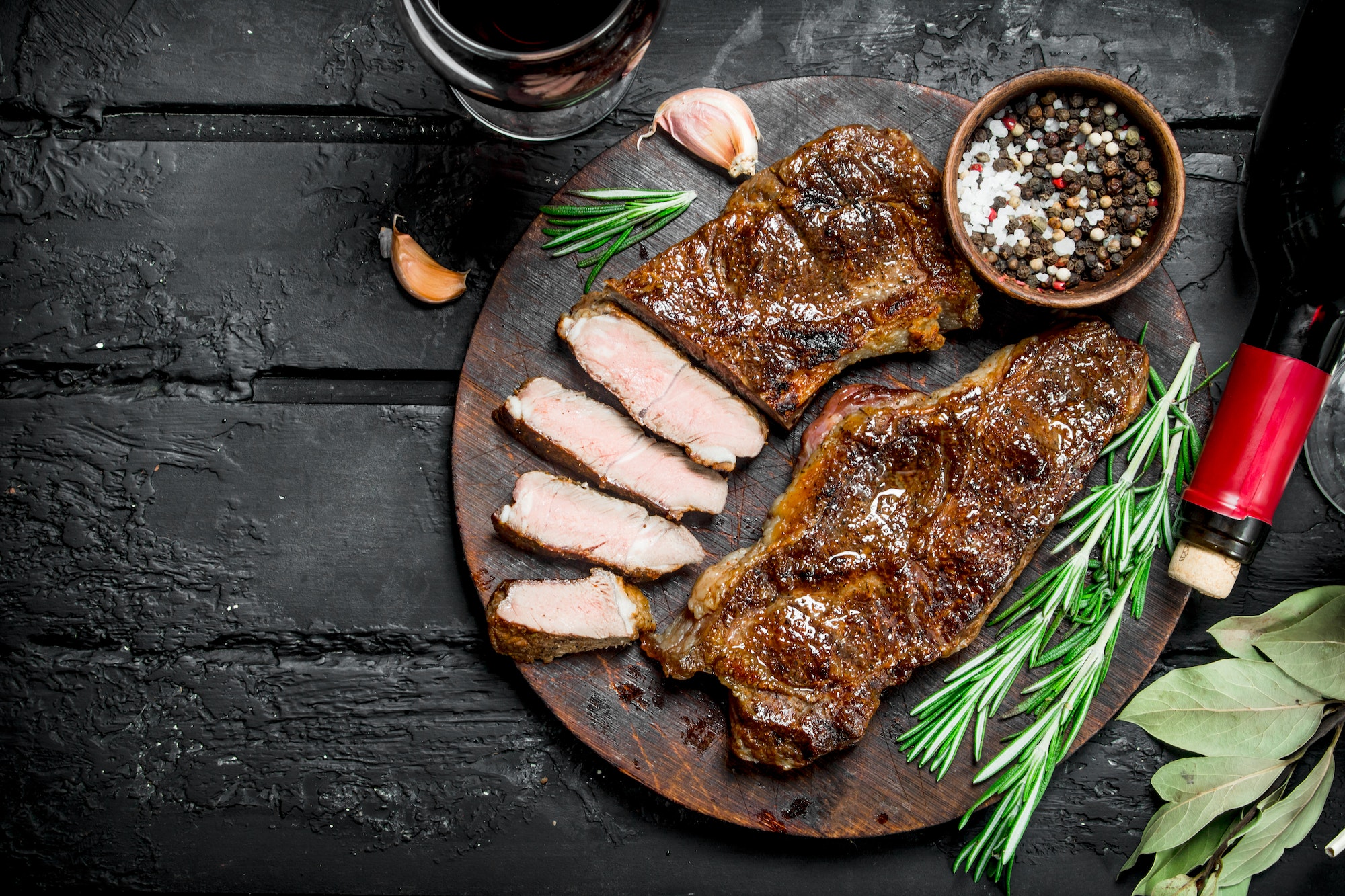 Grilled beef steak with red wine.